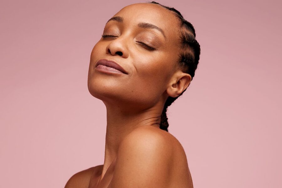 woman with glowing skin after getting MOXI laser treatment in Westford, MA